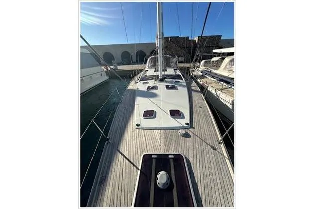  Yacht Photos Pics 2010 Jeanneau 57 yacht docked, showcasing sleek deck design and modern features.