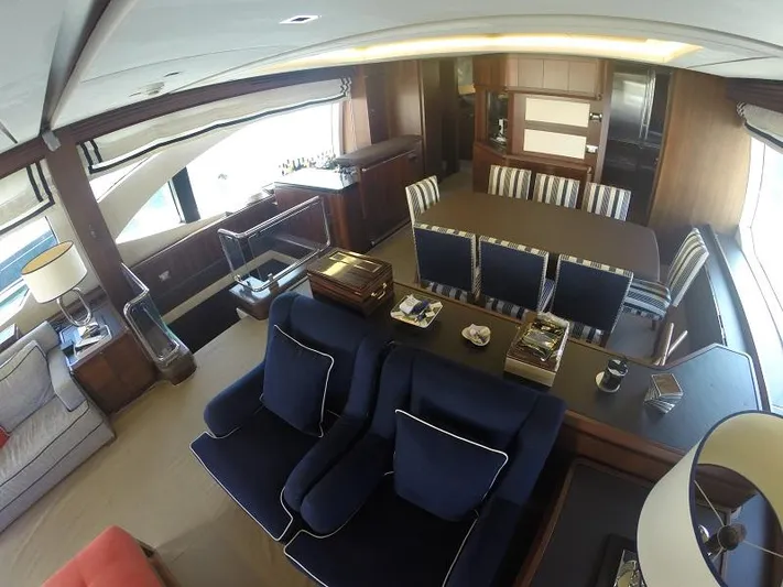  Yacht Photos Pics Luxurious interior of a 2008 Azimut 95 yacht with elegant seating and dining area.