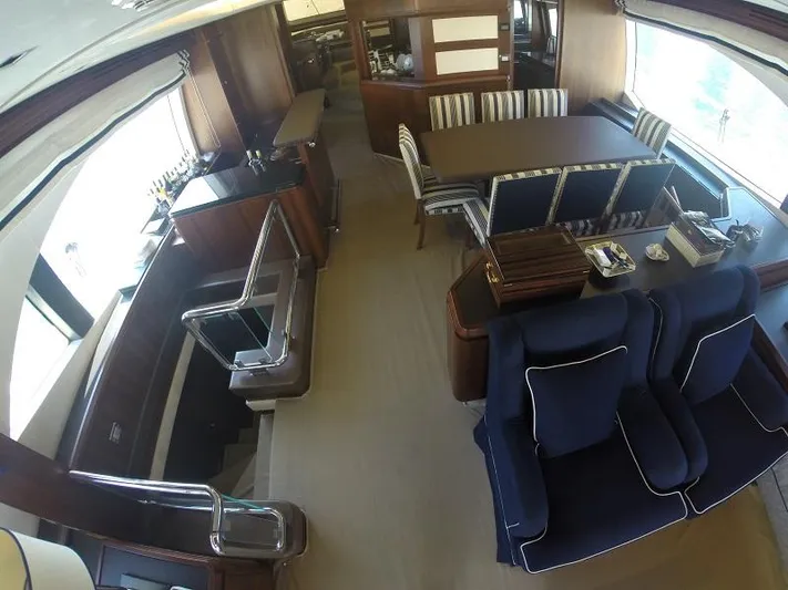  Yacht Photos Pics Luxurious interior of a 2008 Azimut 95 yacht with elegant dining and seating area.