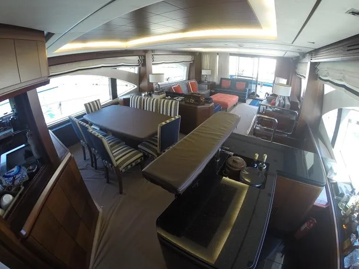  Yacht Photos Pics Luxurious interior of a 2008 Azimut 95 yacht with elegant dining and seating areas.