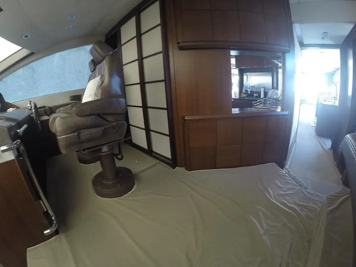  Yacht Photos Pics Luxurious interior of a 2008 Azimut 95 yacht with plush seating and elegant wood paneling.