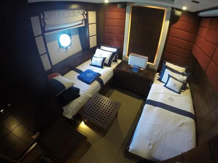  Yacht Photos Pics Luxurious twin cabin interior on 2008 Azimut 95 yacht, featuring elegant bedding and modern decor.