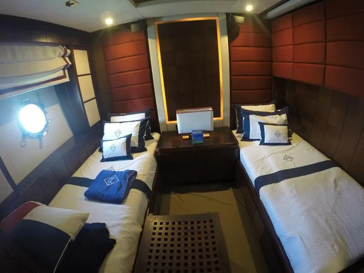  Yacht Photos Pics Luxurious twin cabin interior of 2008 Azimut 95 yacht with elegant bedding and ambient lighting.
