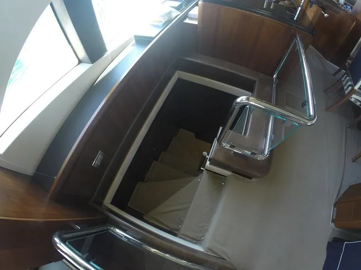  Yacht Photos Pics Staircase on 2008 Azimut 95 yacht, featuring sleek wooden and metal design.