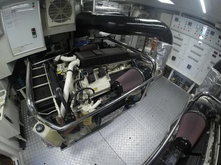  Yacht Photos Pics Engine room of a 2008 Azimut 95 yacht, featuring complex machinery and control panels.