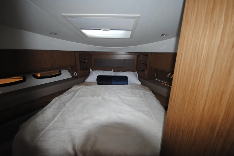  Yacht Photos Pics Luxurious cabin interior of 2017 Sea Ray Sundancer 510 yacht with cozy bed.