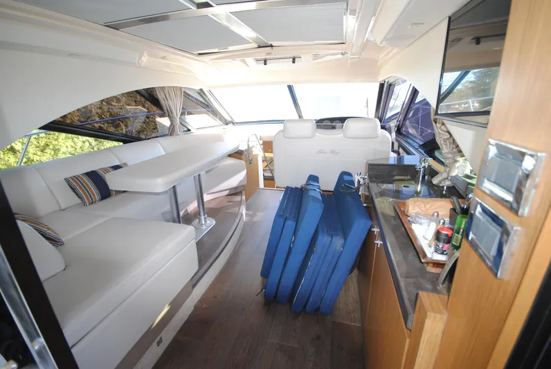  Yacht Photos Pics Luxurious interior of 2017 Sea Ray Sundancer 510 yacht with modern seating and amenities.