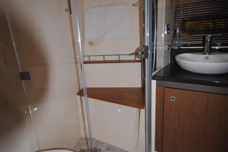  Yacht Photos Pics 2017 Sea Ray Sundancer 510 bathroom with modern sink and shower.