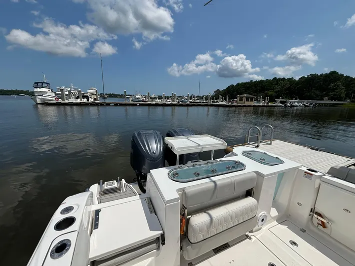  Yacht Photos Pics 2021 Sea Fox 288 Commander boat docked at marina under blue sky.