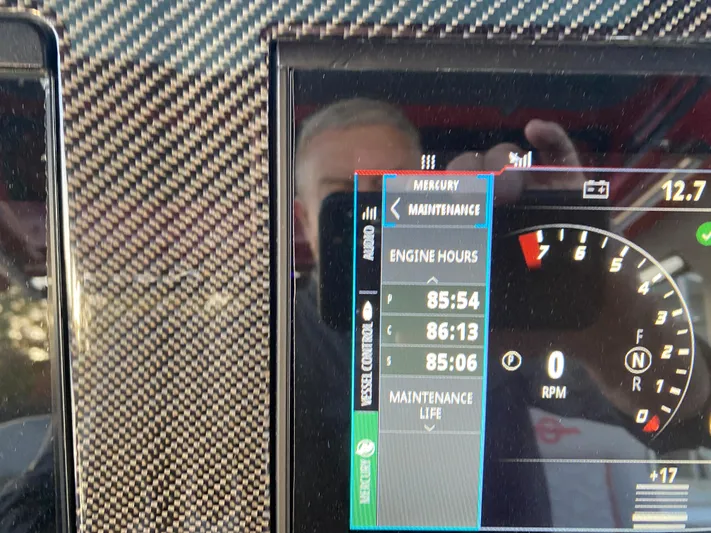  Yacht Photos Pics Dashboard of 2024 Fountain 38 SCX showing engine hours and maintenance details.