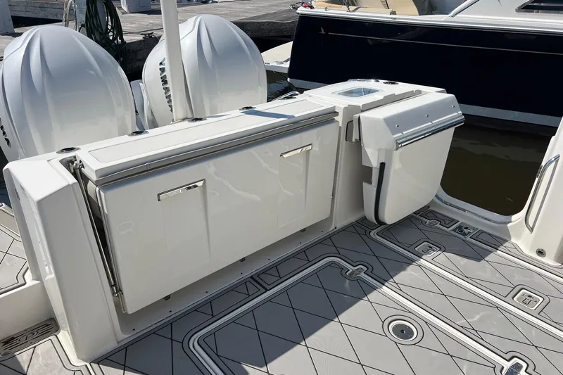  Yacht Photos Pics 2024 Pursuit S 328 Sport boat deck with Yamaha engines and sleek design.