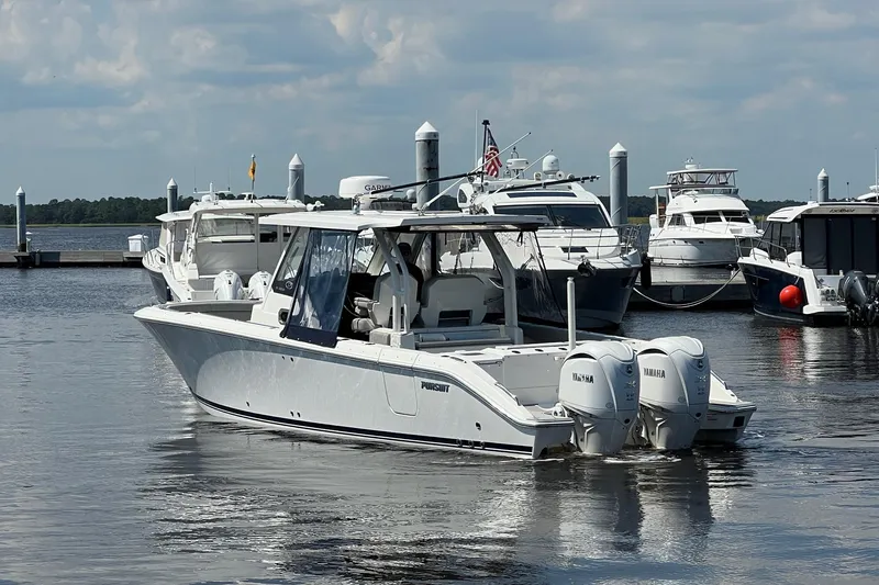  Yacht Photos Pics 2024 Pursuit S 328 Sport boat docked with twin Yamaha engines.