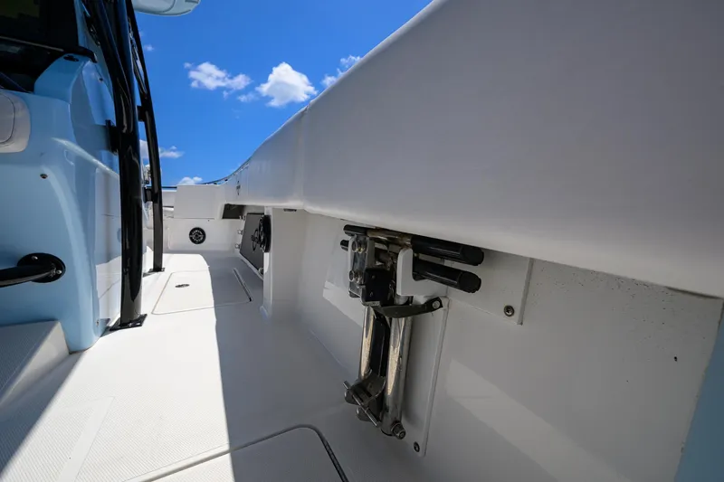  Yacht Photos Pics 2022 Fountain 34 CC boat interior with blue sky background.