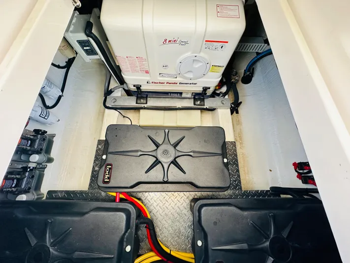 Mr. Sandman Yacht Photos Pics Engine compartment of 2023 Back Cove 34O with Fischer Panda generator and wiring.