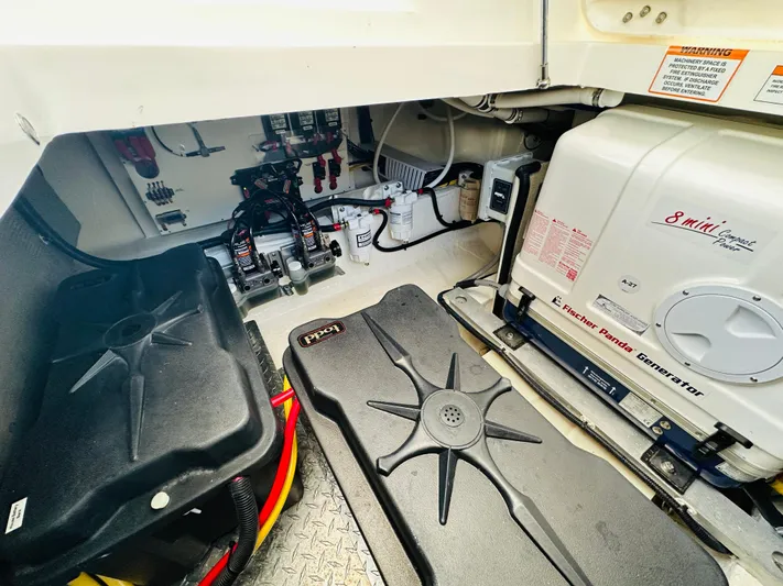 Mr. Sandman Yacht Photos Pics Engine room of 2023 Back Cove 34O with Fischer Panda generator and electrical components.