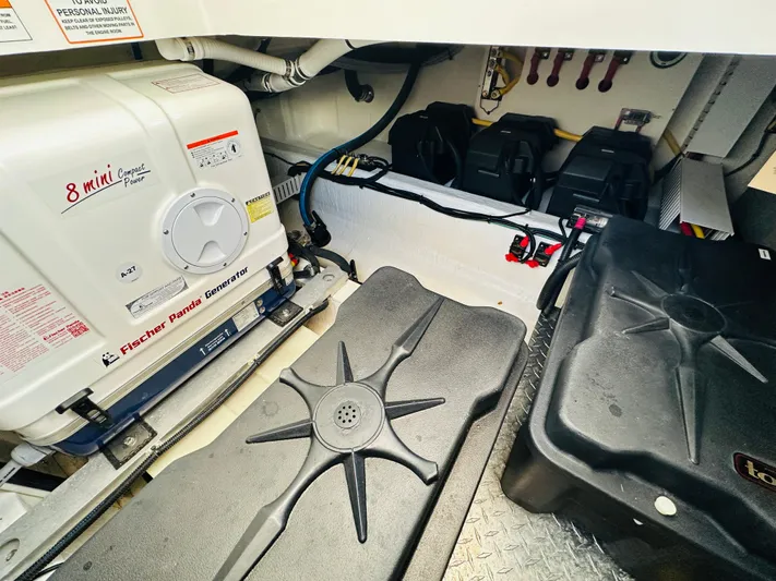 Mr. Sandman Yacht Photos Pics Engine room of 2023 Back Cove 34O with Fischer Panda generator and battery setup.