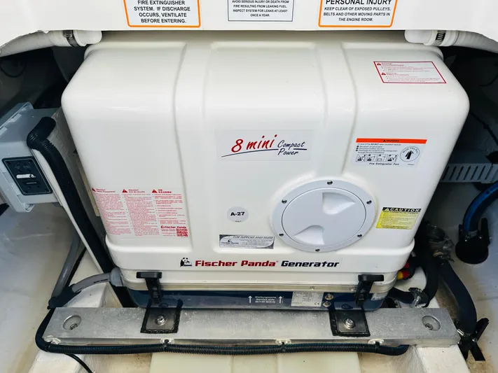 Mr. Sandman Yacht Photos Pics Fischer Panda generator in 2023 Back Cove 34O boat engine room.