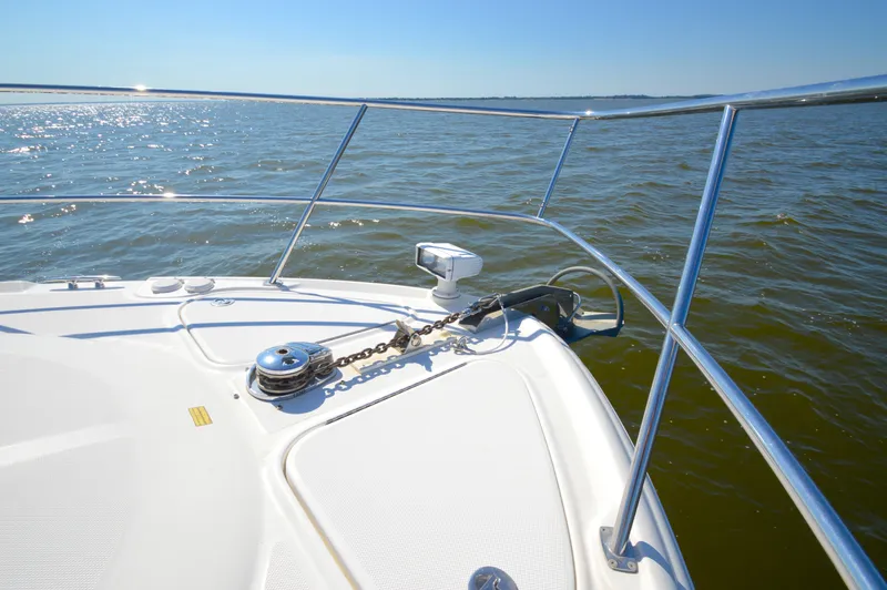  Yacht Photos Pics Bow of 2008 Sea Ray 44 Sundancer yacht on open water, sunny day.