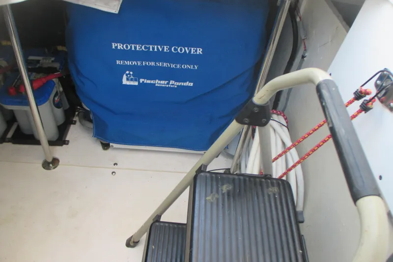 Worth Pursuit Yacht Photos Pics 2013 Pursuit SC 365i Sport Coupe engine room with protective cover and ladder.