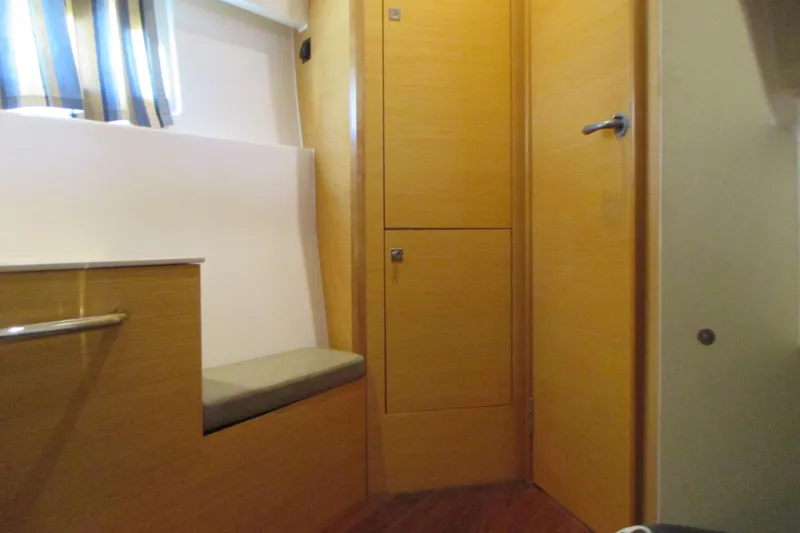 Worth Pursuit Yacht Photos Pics Interior of 2013 Pursuit SC 365i Sport Coupe with wooden cabinetry and seating.