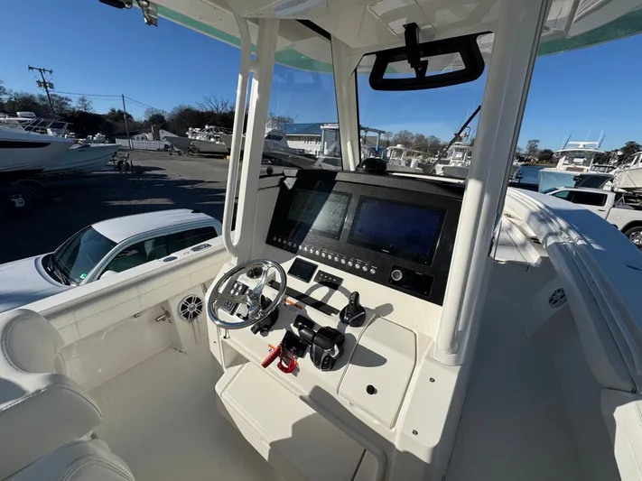 Temp Tag Yacht Photos Pics Interior view of 2022 Regulator 31 boat with modern helm console.