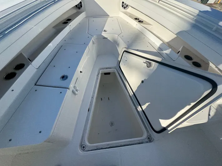 Temp Tag Yacht Photos Pics Open storage compartment on a 2022 Regulator 31 boat.
