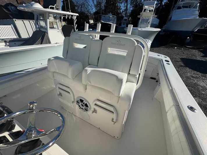 Temp Tag Yacht Photos Pics Interior of a 2022 Regulator 31 boat with white seating.