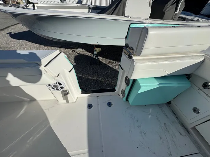 Temp Tag Yacht Photos Pics Interior of a 2022 Regulator 31 boat with seating area.