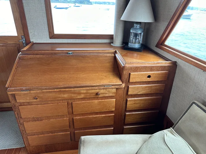 Gitana Yacht Photos Pics 1986 Wilbur Hunt Yachts interior with wooden cabinetry and nautical decor.