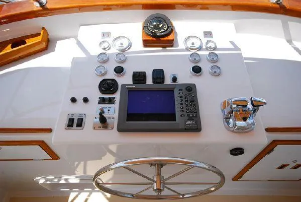 Gitana Yacht Photos Pics 1986 Wilbur Hunt Yachts helm with navigation instruments and steering wheel.