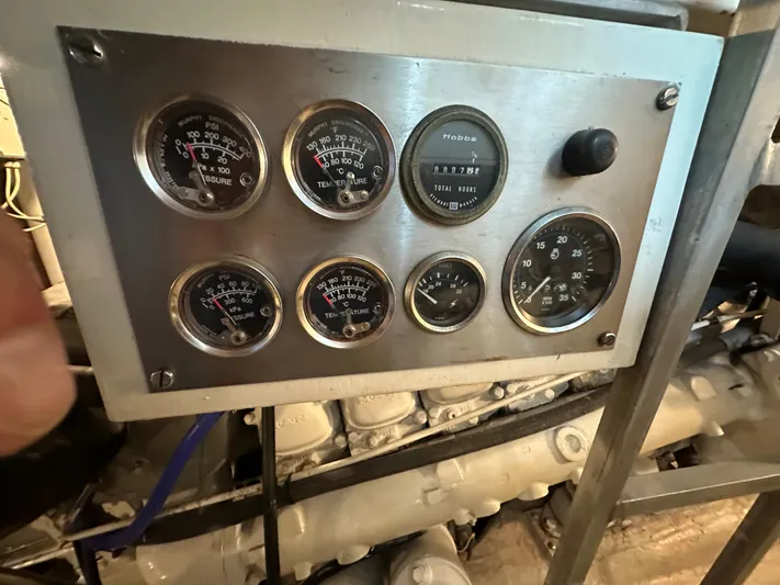 Gitana Yacht Photos Pics Control panel of a 1986 Wilbur Hunt Yachts engine with multiple gauges.