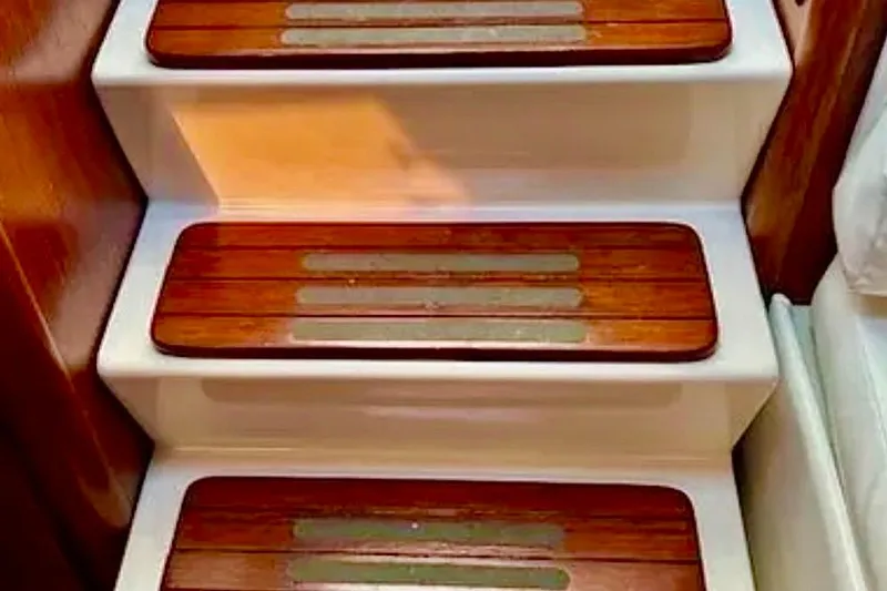  Yacht Photos Pics Wooden steps on a 2000 Tiara 37 Open yacht interior staircase.