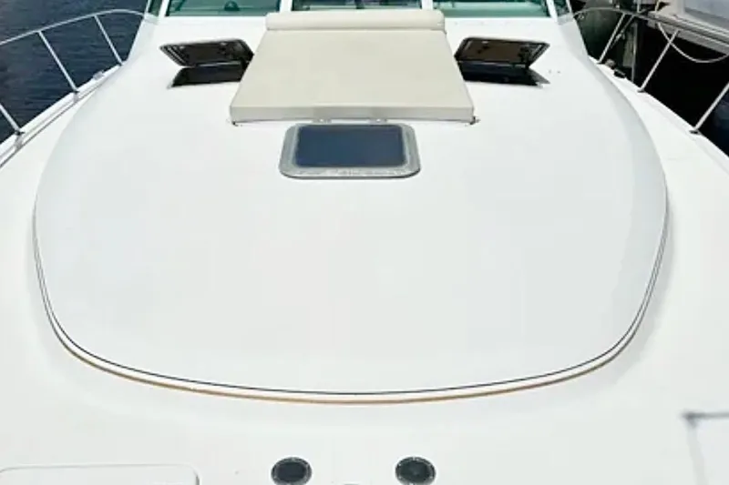  Yacht Photos Pics 2000 Tiara 37 Open yacht deck with sunpad and hatch.