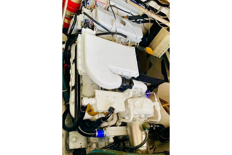  Yacht Photos Pics Engine compartment of a 2000 Tiara 37 Open boat, showcasing mechanical components.