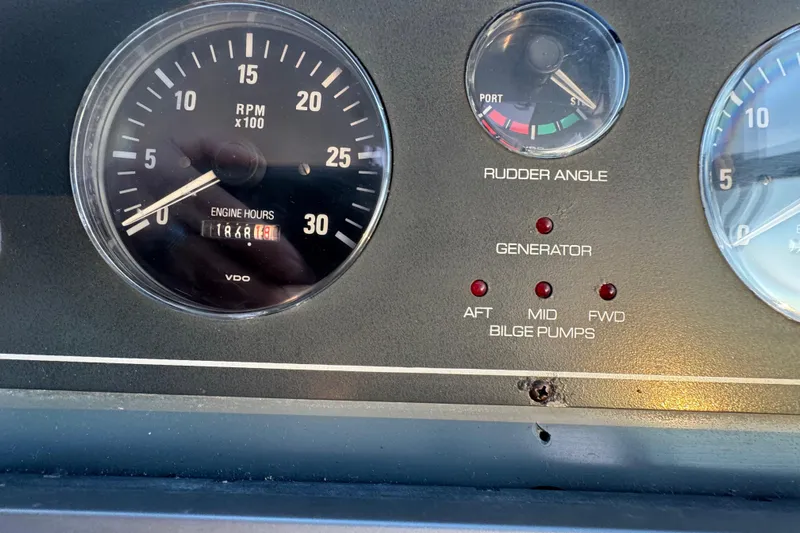  Yacht Photos Pics Instrument panel of 2000 Tiara 37 Open, showing RPM, engine hours, and bilge pump indicators.