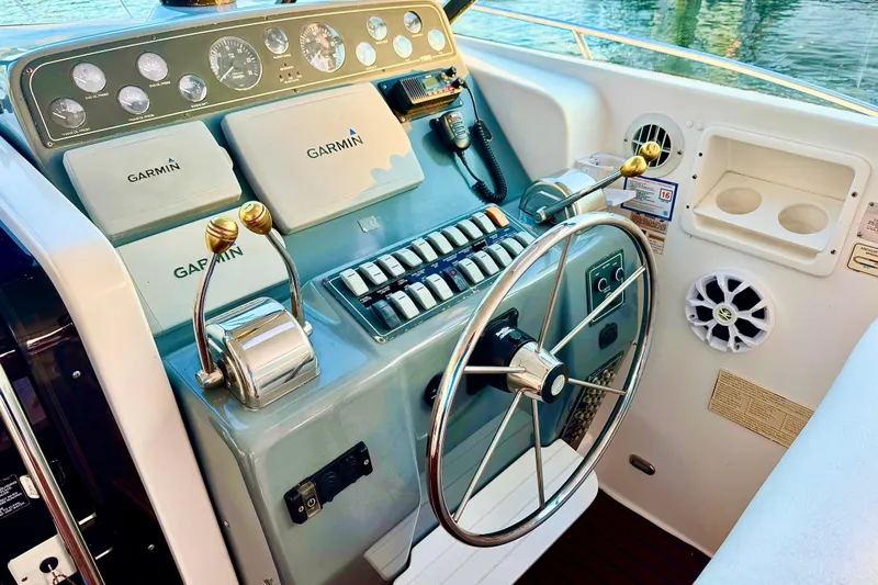  Yacht Photos Pics Control panel of a 2000 Tiara 37 Open boat with Garmin navigation systems.