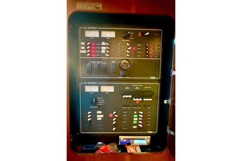  Yacht Photos Pics Electrical control panel on a 2000 Tiara 37 Open boat, featuring DC and AC systems.