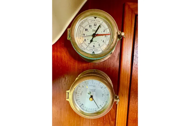  Yacht Photos Pics Brass tide clock and barometer on Tiara 37 Open, 2000 model boat.