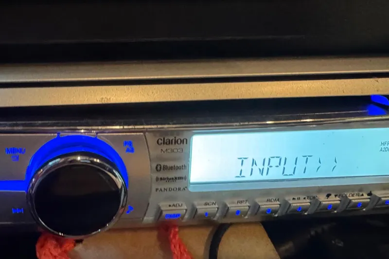  Yacht Photos Pics Clarion M303 stereo system in a 2000 Tiara 37 Open boat, displaying "INPUT".