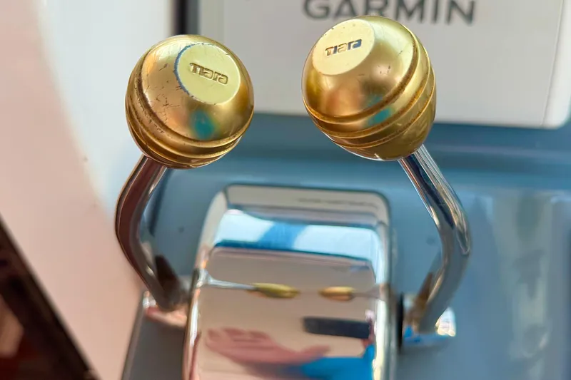  Yacht Photos Pics Close-up of Tiara 37 Open 2000 boat throttle controls with Garmin equipment.