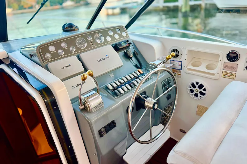  Yacht Photos Pics Control panel of a 2000 Tiara 37 Open boat with Garmin navigation systems.
