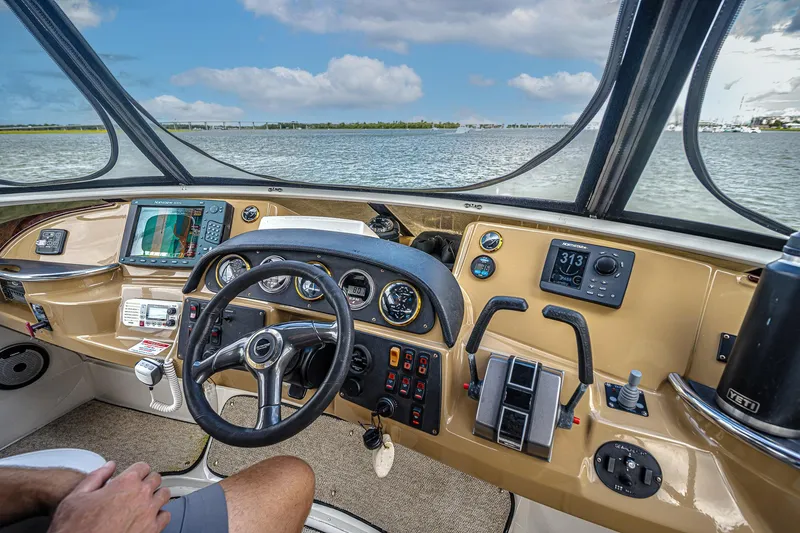 Fiesta Bayb Yacht Photos Pics Cockpit view of 2003 Carver 444 Cockpit Motor Yacht with navigation instruments.