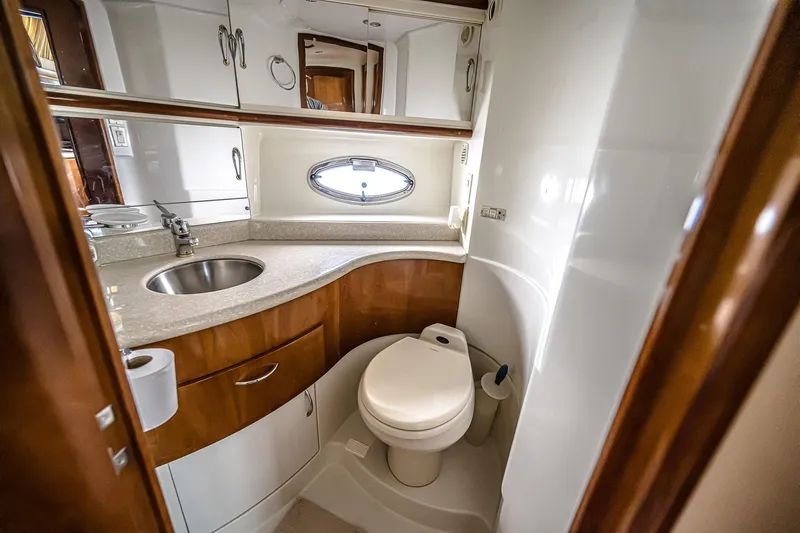 Fiesta Bayb Yacht Photos Pics Luxurious bathroom in 2003 Carver 444 Cockpit Motor Yacht with modern fixtures.