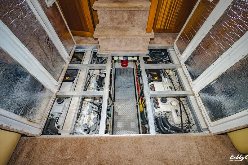 Fiesta Bayb Yacht Photos Pics Engine room of 2003 Carver 444 Cockpit Motor Yacht with visible machinery and components.