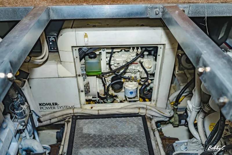 Fiesta Bayb Yacht Photos Pics Engine room of 2003 Carver 444 Cockpit Motor Yacht with Kohler power systems.