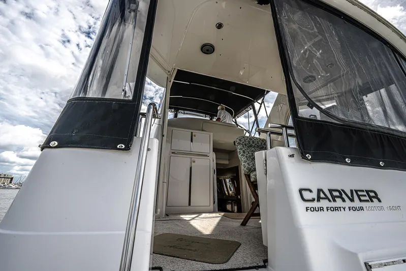 Fiesta Bayb Yacht Photos Pics 2003 Carver 444 Cockpit Motor Yacht, rear view with open cockpit and interior glimpse.