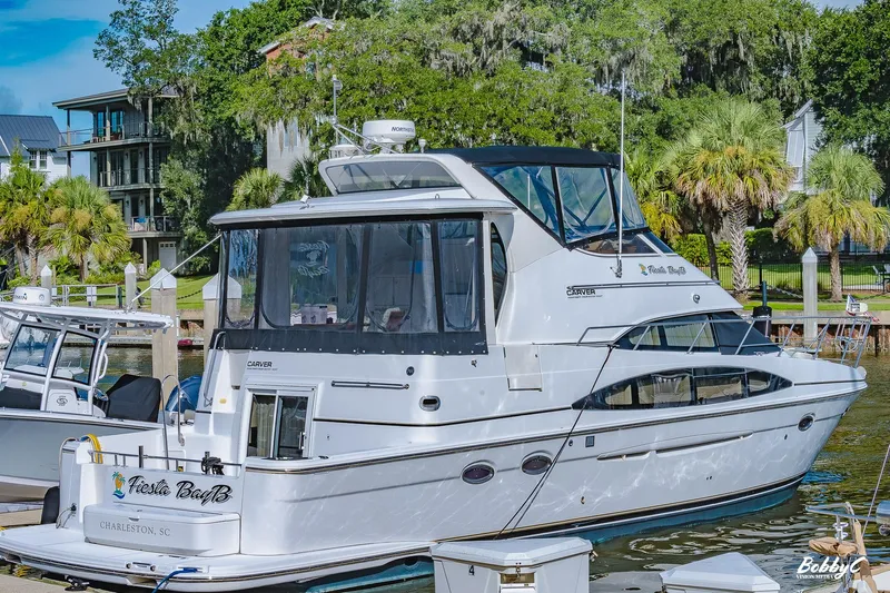 Fiesta Bayb Yacht Photos Pics 2003 Carver 444 Cockpit Motor Yacht docked in Charleston, SC marina.