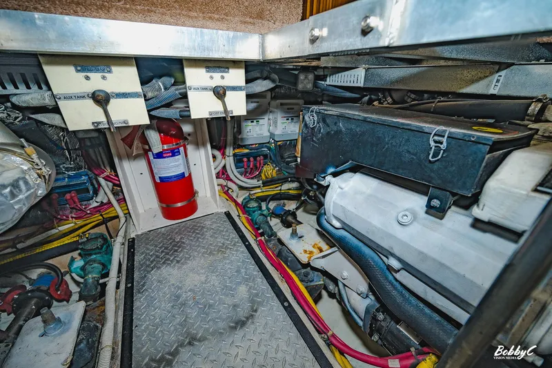 Fiesta Bayb Yacht Photos Pics Engine room of 2003 Carver 444 Cockpit Motor Yacht with fire extinguisher and wiring.