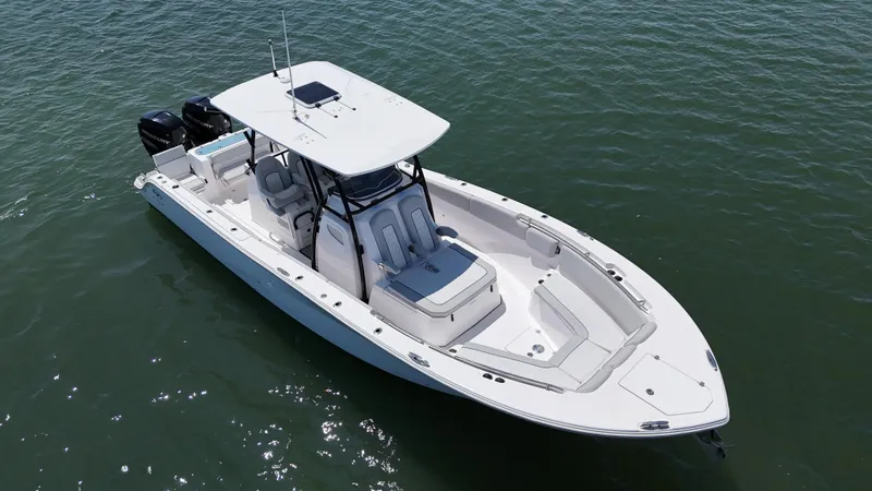 O4 Yacht Photos Pics 2022 Sea Fox 328 Commander boat on water, featuring sleek design and spacious deck.