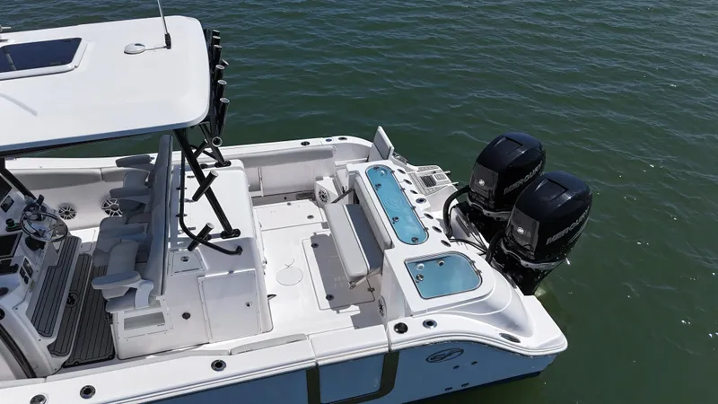 O4 Yacht Photos Pics 2022 Sea Fox 328 Commander boat with dual outboard engines on the water.